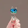 Broche de piedra ojo de gato moda femenina personalidad versátil corsage suéter cheongsam traje atmosférico ropa fija abrigo adornos