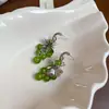 Pendientes de borla de flor de cuentas de color dopamina para primavera, sensación de lujo ligero y alta gama, pendientes atmosféricos estilo vacacional para mujer