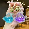 Llavero Creativo Serie Océano Relleno de Aceite Pez Payaso Estrella de Mar Pez Pequeño Colgante de Bolso Decoración de Llavero