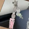 Flocagem de resina fofa tridimensional colorida roupas gato chaveiro pingente chaveiro de carro pingente de bolsa atacado