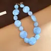 Conjunto de collar y aretes de cuentas redondas acrílicas transfronterizo europeo y americano, accesorios de moda para el día a día con diseño versátil
