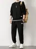 Conjunto deportivo de gofres transfronterizo Suelto Casual Otoño e Invierno Nuevo Cuello Redondo para Hombre Manga Larga Pantalones Ropa Juvenil