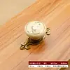 Manija de cerámica de aleación de zinc para puerta de gabinete, moderna, simple, estilo chino, para armario, manija pequeña redonda de un solo orificio.
