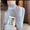Camisa básica de cuello medio alto negra nueva de punto popular para mujer, otoño e invierno, estilo occidental, manga larga, corte entallado interior.