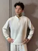 Camisa polo de manga larga estilo americano para hombre, modelo de principios de otoño, cuello henley de media botonadura, mangas raglán, color liso, top casual simple