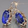 Pendientes de gancho para la oreja con forma de pulpo de oro grande con incrustaciones de gemas simples de moda europea y americana de Yanni