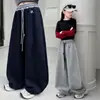 Pantalones atléticos y casuales de cintura alta para niñas para otoño, adecuados para estudiantes de primaria y secundaria, elegantes pantalones deportivos de pierna recta holgados