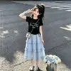 Verano 2026 Camiseta de Manga Corta con Cordón y Estampado de Letras a la Moda Estilo Coreano Falda de Encaje Dulce Casual Conjunto de Dos Piezas