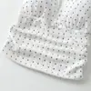 Atacado de roupas femininas transfronteiriças 2026 outono novo sexy hot girl rede poá gola halter sem costas camisola
