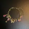 Pulsera de Violín con Mariposa Vintage