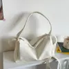 Bolso Sencillo Tipo Almohada con Patrón de Lichi para Mujer 2026 Nuevo Color Sólido Bolso de Verano para Commuter Moda de Nicho Bolso de Hombro Retro