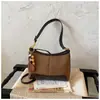 Bolso de Hombro Único de Moda Retro de Alto Valor 2026 Otoño Nueva Llegada Gran Capacidad Nicho para Viajes Cotidianos de Mano Bajo el Brazo