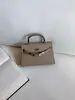 Bolsa 2026 Nuevo Estilo de Moda Segunda Generación Bolso Kelly 22cm Hebilla Plateada Primavera Verano Sentido de Alta Gama Bolso para Mujer Hombro Único Cruzado de Hombro Bolso de Mano