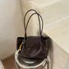 Bolsa de ombro feminina da moda 2026 nova de verão de alto valor simples bolsa de ombro grande capacidade casual para o dia a dia bolsa tote