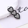 La moda europea y americana ama los colgantes de joyería de diamante de aleación, colgantes para pendientes DIY, accesorios creativos de borla en stock, venta al por mayor