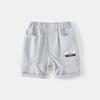 Calças cropped para meninos Verão 2023 Shorts com bolso de etiqueta tecida para crianças Calças médias casuais para bebês Calças infantis estilo coreano atacado