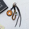 Novo Pingente de Rosca de Couro PU da Huayang Bolsa Chaveiro Lanyard de Telefone Acessório Decorativo Trançado