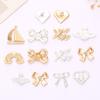 Accesorios de joyería de aleación de zinc multiestilo creativos para manualidades, diamantes, arcoíris, amor, agujeros para zapatos, accesorios de flores, venta al por mayor en Yiwu
