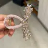 Presilha de Garra de Cristal de Luxo Leve de Alta Qualidade Presilha Tubarão Moda Feminina Versátil Presilha para Coque na Parte de Trás da Cabeça Nova Garra de Cabelo Acessório de Cabelo