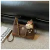 Bolsa de corrente com estampa de leopardo da moda para mulheres, nova bolsa de ombro e transversal versátil, estilo coreano de nicho, tendência para o dia a dia.