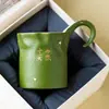 Taza de Café de Cerámica Verde Mandarina Pequeña Espolvoreada con Oro Hecha en Fábrica Taza para Latte Pintada a Mano Taza para Espresso Chino Juego de Taza y Platillo de Alto Valor