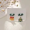 Pendientes navideños de diamantes con dibujos animados, transfronterizos europeos y americanos, pendientes asimétricos de alta gama para mujer, decoraciones navideñas