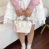 Bolsa de Mão Fofa Versátil Estilo Coreano para Mulheres, Nova Tendência 2026, Bolsa Transversal de Compras Estética de Desenho Animado de Nicho