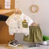 Conjunto de Verano para Niños 2026 Estilo Nuevo Infantil Niños Camisa de Dibujos Animados de Verano Manga Corta Conjunto de Tres Piezas Bebé Venta al por Mayor