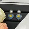 Novedad 2025 Pendientes de Resina en Forma de Corazón Color Dopamina para Mujer con Agujas de Plata, Pendientes de Lujo de Alta Gama al por Mayor