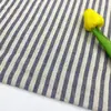 Lavar solo a manchas agua poliéster algodón hilo teñido serie de camisas a rayas vestido de moda tela de camisa a rayas teñida con hilo