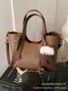 Bolso de Mano de Alta Gama Versátil de Nicho Nuevo para Mujer Textura Retro Hombro Único Cruzado Cubo Bolso de Viaje