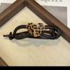 Tiara para el cabello de mujer con clip giratorio de gato con estampado de leopardo 2024 de alto nivel