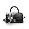 Bolsa cuadrada pequeña portátil de estilo coreano de alta gama, temperamento simple, nueva para primavera y verano, moda casual, todo-partido, bandolera de PU para mujer