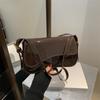 Nuevo bolso de hombro de charol 2025, nuevo bolso de trabajo sencillo y moderno para mujer, bolso bandolera de alta gama para debajo del brazo.