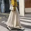 Novo vestido de tricô, modelagem solta, comprimento médio, saia evasê, barra larga, adequado para usar como peça externa no outono e inverno