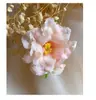 Forma de flor de camélia branca flor de cabeça flor florzinha presilha de cabelo flor de cabeça presilha de cabelo rede vermelha atmosfera presilha lateral mulheres