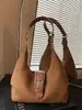Bolso de axila de diseño nicho retro casual para el día a día 2026 transfronterizo, bolso de mano para mujer, bolso de hombro, bolso cruzado, bolso tote