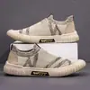 Novos tênis de lona masculinos 2026 outono sapatos com painel em malha respiráveis versáteis sapatos masculinos estilo coreano modernos mocassins slip-on