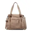 Nueva Bolsa de Lona de Color Puro 2025 para Mujer Bolso de Hombro de Gran Capacidad Bolso Tote Versátil para Estudiantes Bolso de Mano Bolso Cruzado