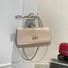 Bolsa de hombro tipo baguette cruzada de comercio exterior simple para mujer 2026 Nueva moda elegante moderna