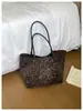 2026 Nova Bolsa Tote Estampada de Leopardo Feminina Grande Capacidade para o Dia a Dia Bolsa de Ombro High-End Retro Moda Versátil Bolsa de Mão