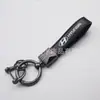 Llavero popular transfronterizo con logo de coche, colgante de alta gama con logo de coche, accesorios de llavero para motocicletas y vehículos eléctricos
