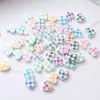Decoración de pendientes de estrella de la suerte pentagonal de agujero recto de resina con cuentas de dibujos animados, material de accesorios DIY, ventas directas de fábrica