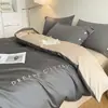 Juego de ropa de cama de lujo de cuatro piezas de algodón de fibra larga de 80 hilos, sábana bajera 100% algodón, funda de edredón bordada, juego de tres piezas de alta gama