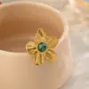 Amazon Europeo y Americano retro lujo alta gama anillo joyería al por mayor flor incrustada turquesa africana anillo de oro mujer