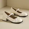 Zapatos Mary Jane blancos para mujer, nueva colección de primavera 2026, versátiles con un lazo, planos de punta poco profunda estilo francés, estilo preppy, zapatos pequeños de cuero