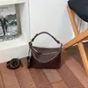 Bolsa de mão tecida de alta qualidade, nicho, nova moda 2026, bolsa de ombro grande capacidade para o dia a dia, bolsa de bolinho feminina