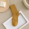 Calcetines de invierno para mujer con forro polar gruesos cálidos calcetines de rizo calcetines de media pantorrilla para mujer calcetines para el suelo de color liso combinan con todo calcetines de toalla
