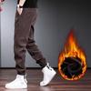 Pantalones de pana de otoño e invierno para hombre, pantalones casuales gruesos con forro polar para hombre, pantalones cónicos holgados de moda negros de talla grande