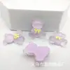 Polvo fino transparente oso con lazo parche de resina transparente transparente material para caja de almacenamiento de cabeza de accesorio para el pelo de funda de teléfono de pegamento de crema DIY